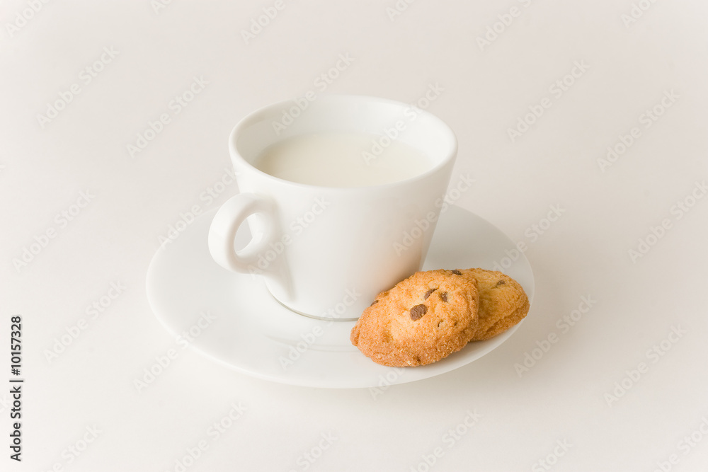 Cup of coffee with milk and cookies, studio isolated Cup of coffee with milk and cookies, studio isolated