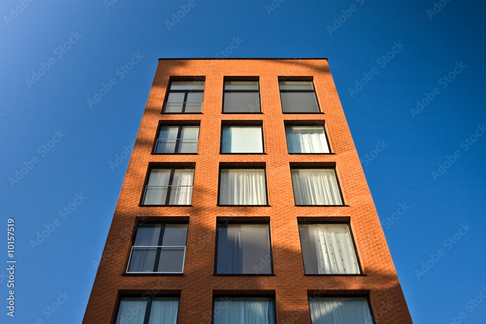 New office building with blue sky. Horizontal background