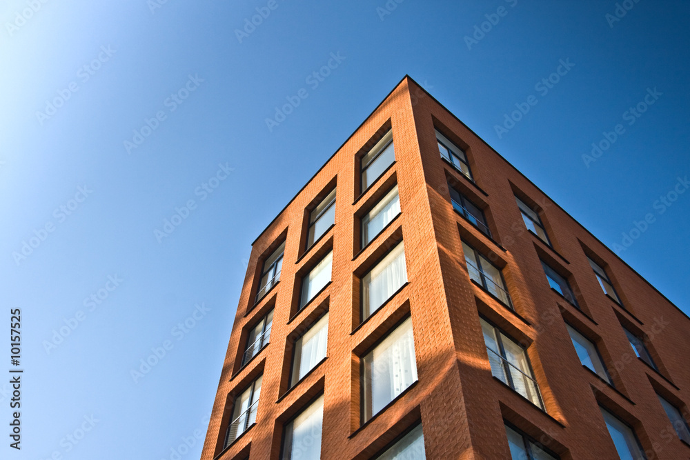 New office building with blue sky. Horizontal background.