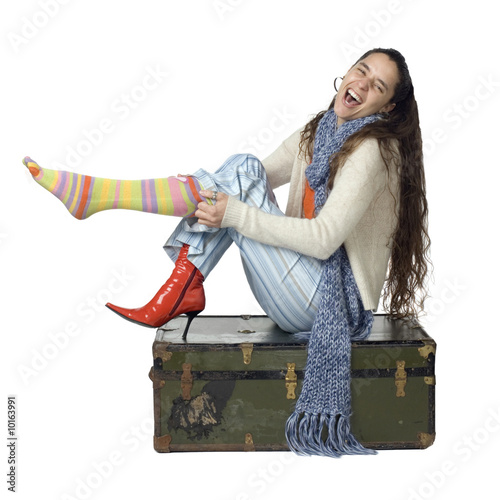 Φωτογραφία Portrait of woman sitting on camp trunk, laughing