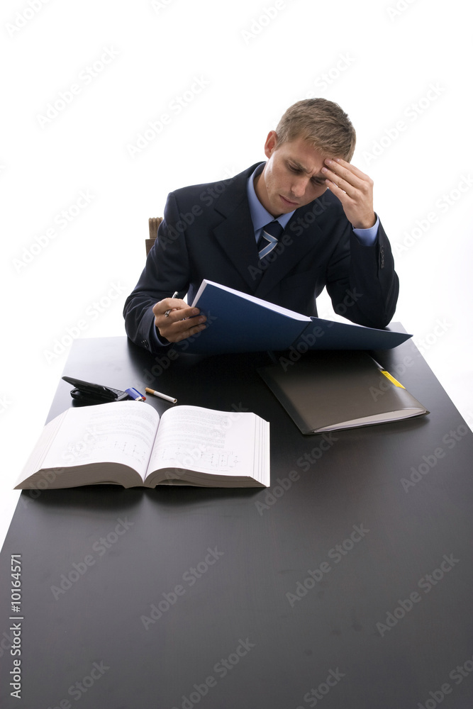 young businessman at work, isolated over white young businessman at work, isolated over white