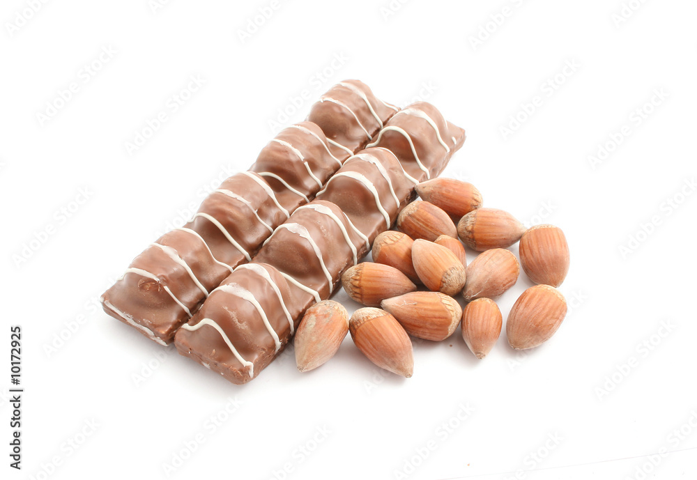 chocolate with hazelnuts isolated on white chocolate with hazelnuts isolated on white
