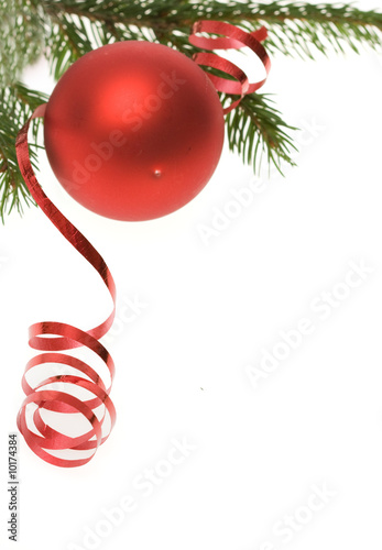 red Christmas bauble and ribbon on white background