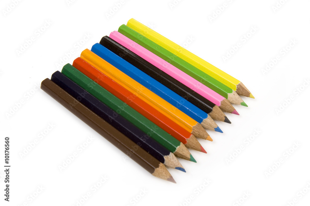 Coloured drawing pencils isolated on a white studio background. Coloured drawing pencils isolated on a white studio background.