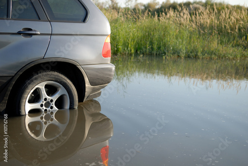 car stuck in the lake