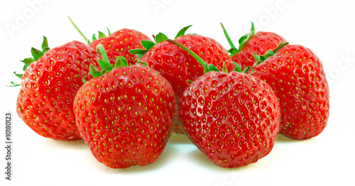 seven fresh strawberries on a white background