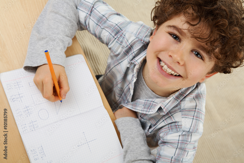 Young boy doin homework Young boy doin homework