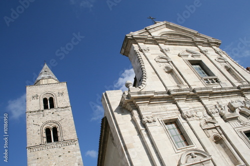 Lucania, chiesa, facciata della Cattedrale barocca in stile normanno di Melfi in Basilicata con campanile quadrato e bifore, pietra calcarea bianca photo