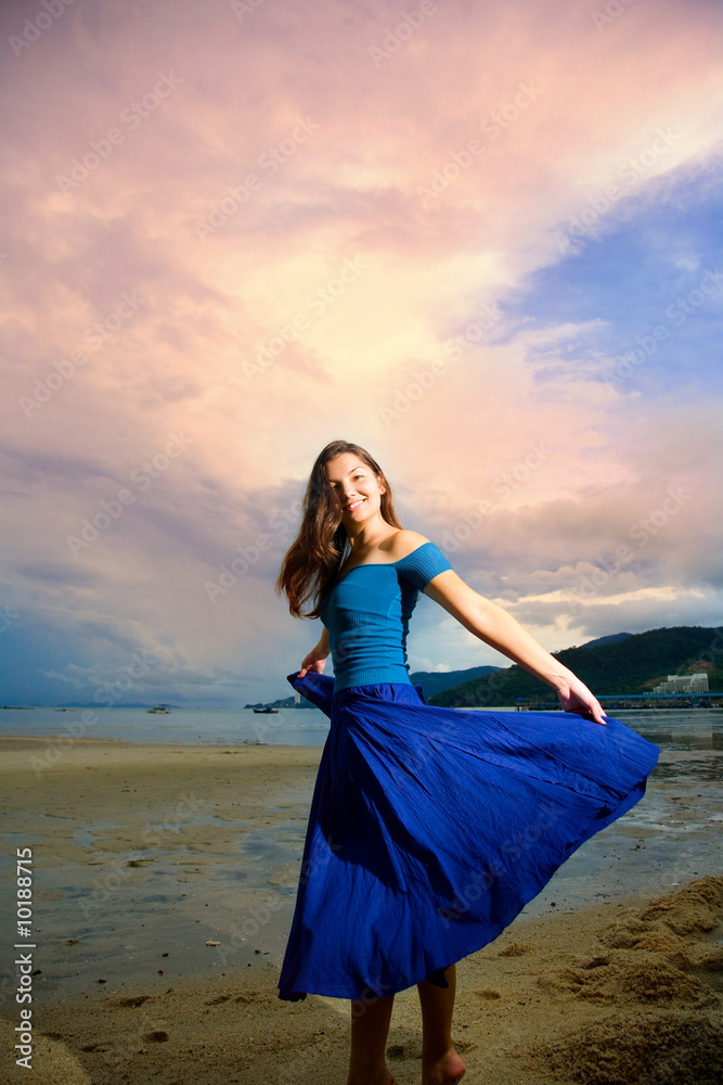 young eurasian woman at the sunset beach young eurasian woman at the sunset beach