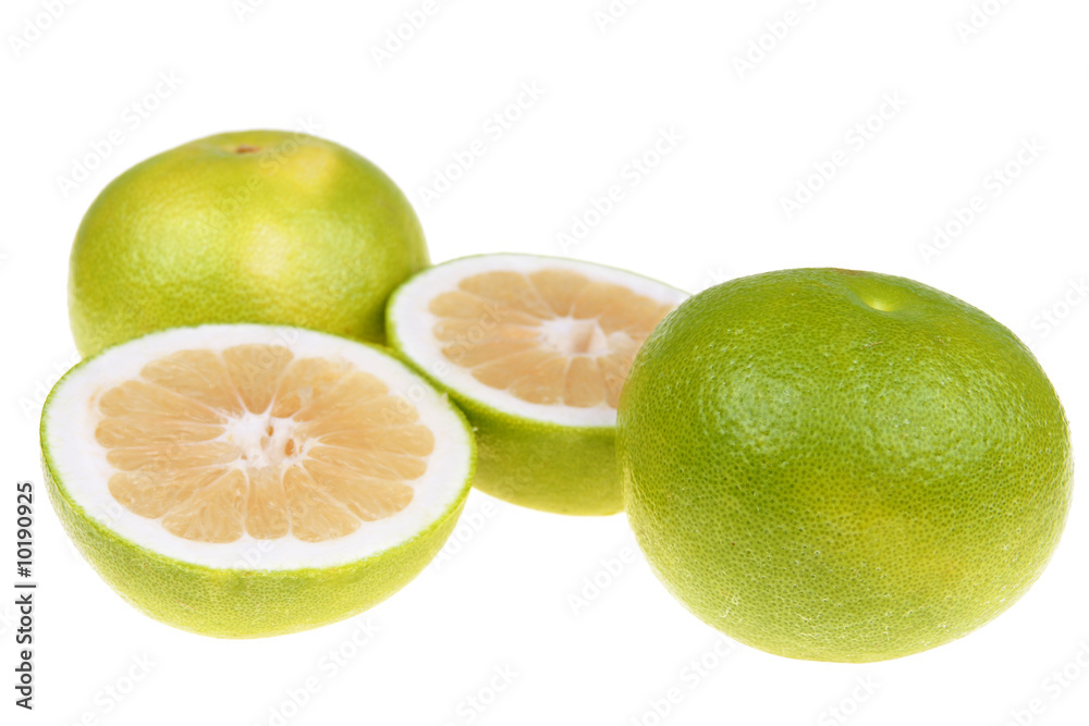 Big green grapefruits close-up on white background Big green grapefruits close-up on white background