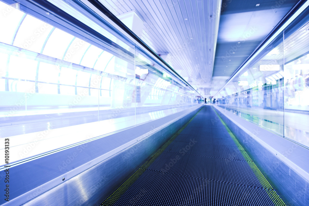 Blue moving escalator in the office hall perspective view Blue moving escalator in the office hall perspective view