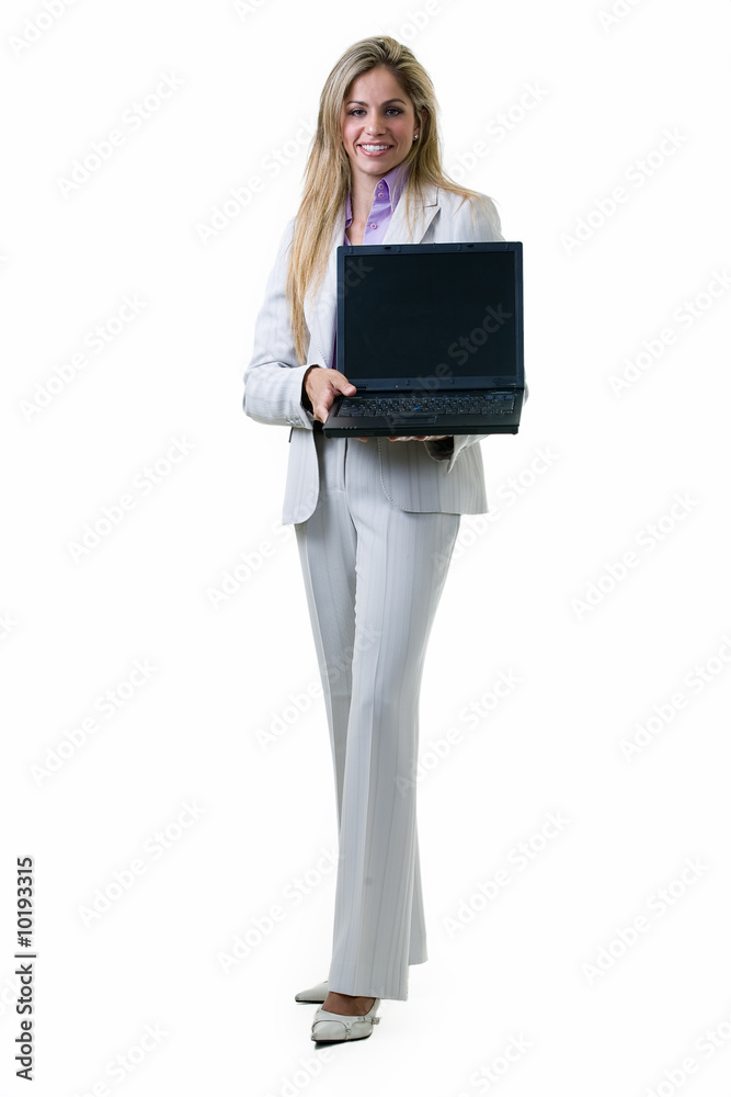 woman in grey colored business suit showing an laptop woman in grey colored business suit showing an laptop