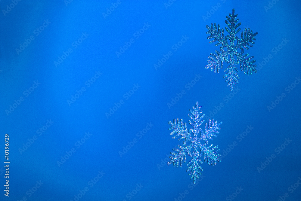It's a orange backround shot with 2 snowflakes at right It's a orange backround shot with 2 snowflakes at right