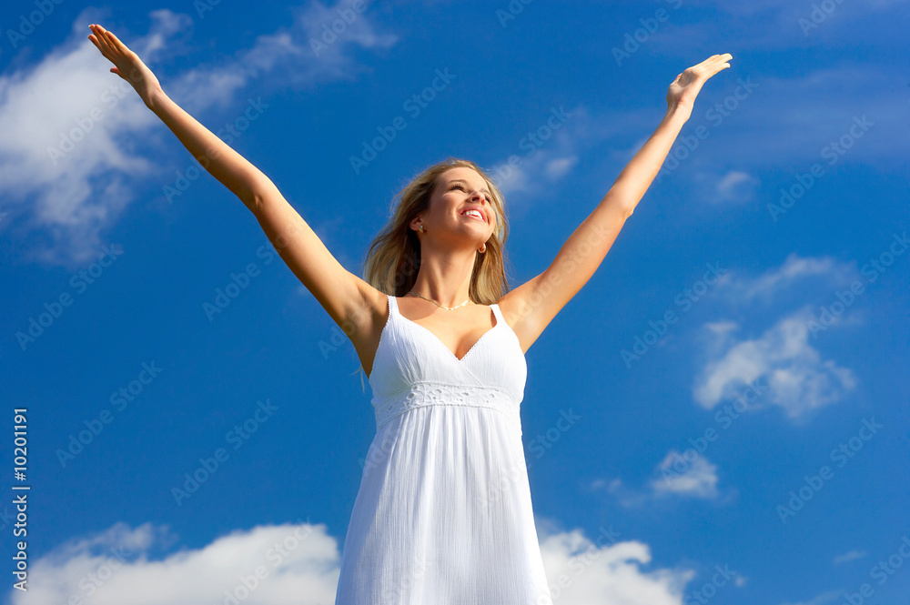 Beautiful young woman under blue sky. Portrait. Beautiful young woman under blue sky. Portrait.