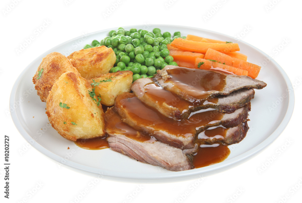 Roast dinner with lamb, potatoes and vegetables Roast dinner with lamb, potatoes and vegetables