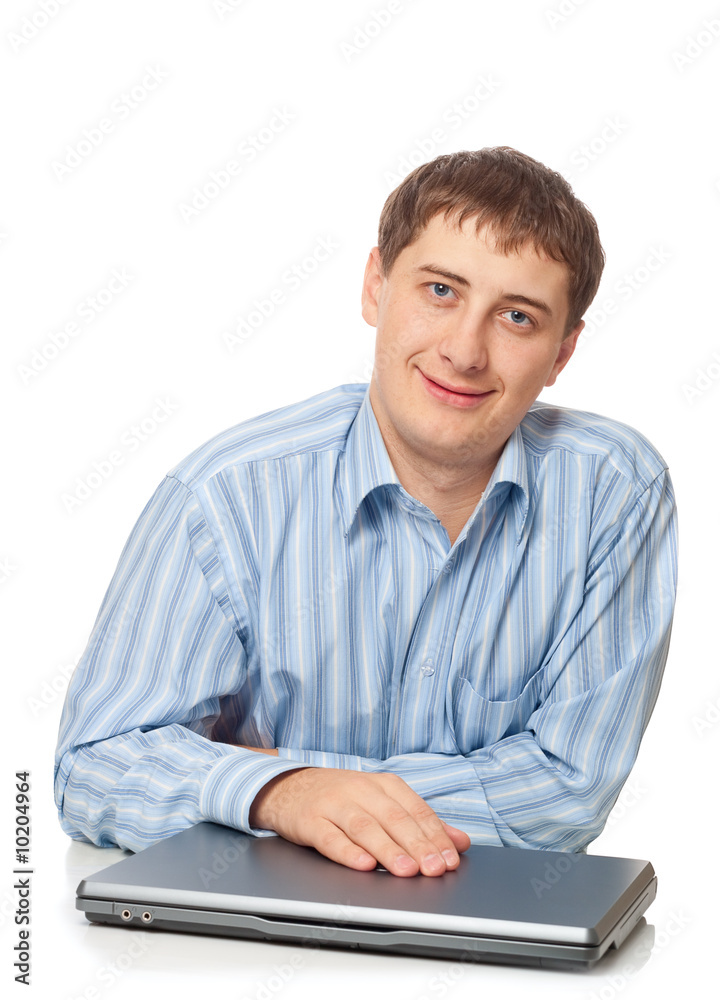 young adult businessman sitting with closed laptop young adult businessman sitting with closed laptop