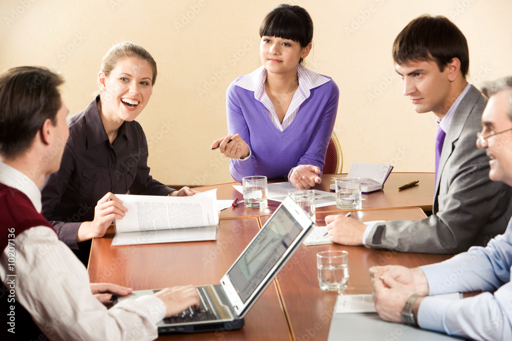 Portrait of successful business partners interacting Portrait of successful business partners interacting