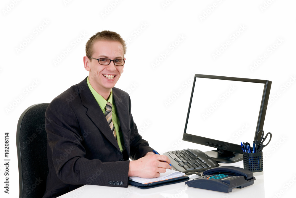 Handsome young successful businessman in the office Handsome young successful businessman in the office
