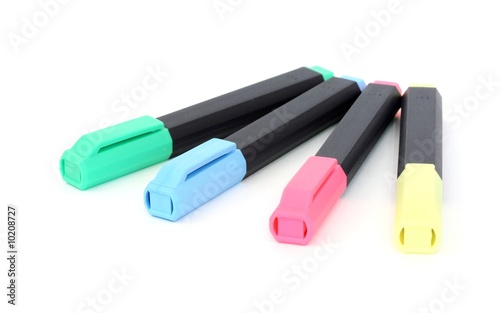 colorful highlight pens on white background