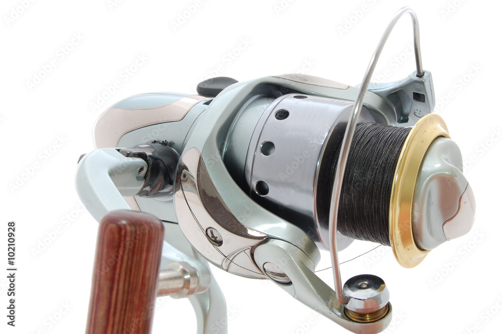 spinning reel isolated on a white. spinning reel isolated on a white.