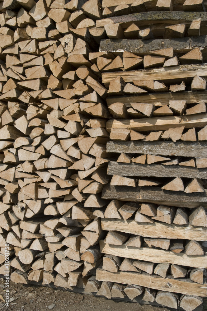 Woodpile out behind the barn in Switzerland Woodpile out behind the barn in Switzerland