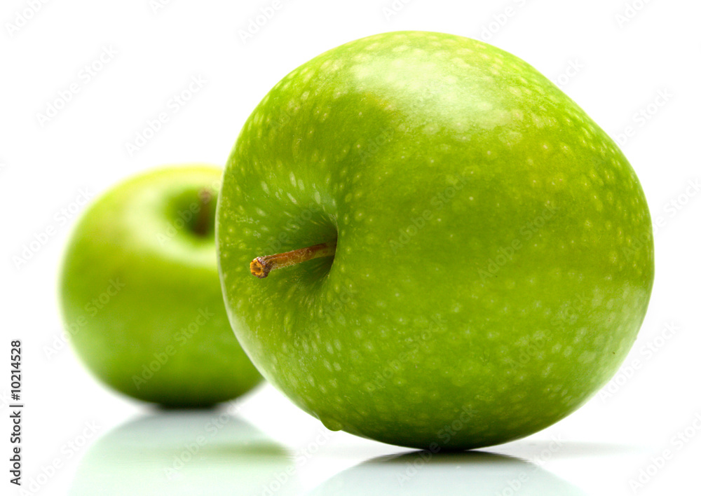 Green apples on the white background. Isolated. Green apples on the white background. Isolated.