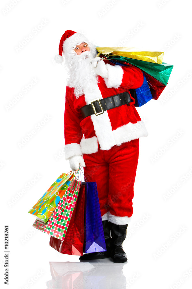 Shopping Christmas Santa. Isolated over white background. Shopping Christmas Santa. Isolated over white background.
