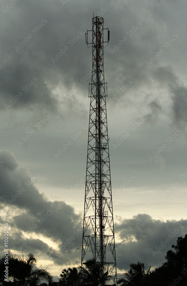 silhouette of a transmitter with an overcast sky background