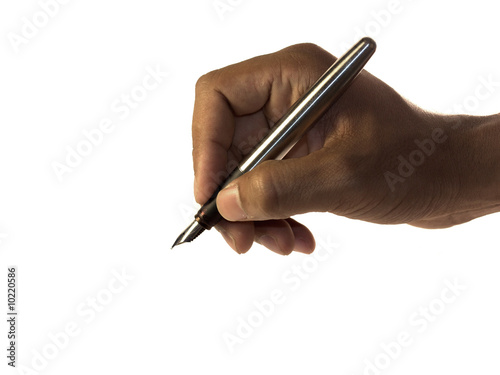 Hand ready to sign with a fountain pen