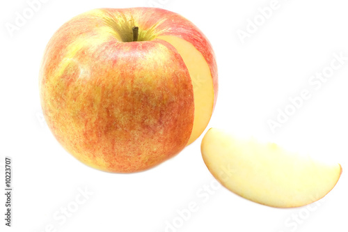 Red apple sliced isolated on white.