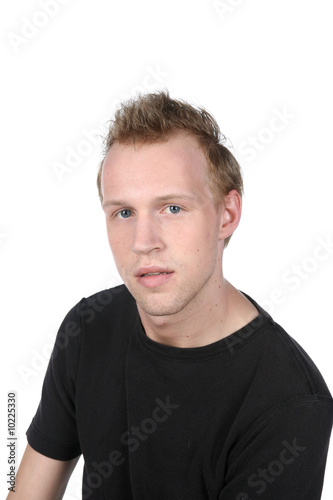 head shot of handsome, young man with dark shirt