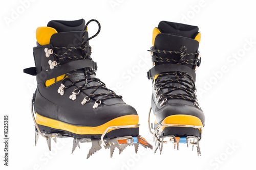 pair of the high mountain boots with crampons
