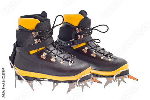 pair of the high mountain boots with crampons