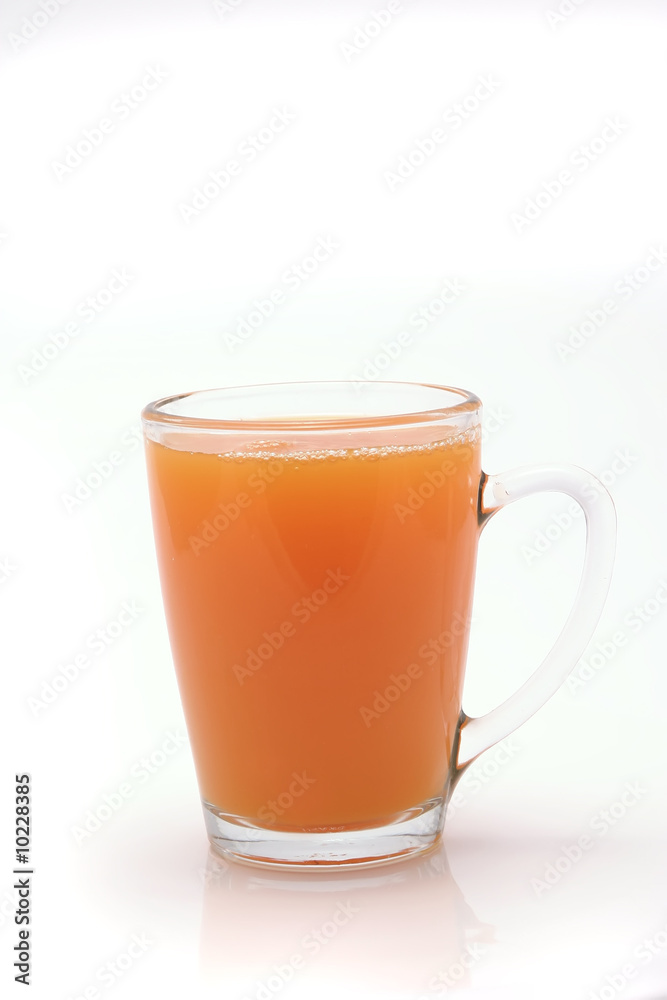 small transparent glass with orange juice small transparent glass with orange juice