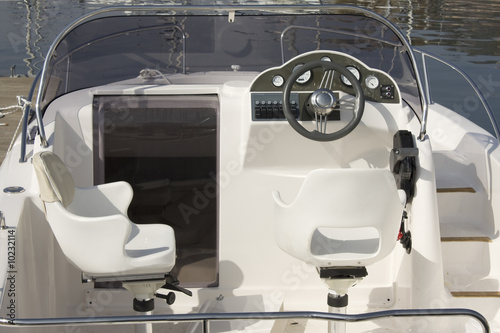 Motor boat cockpit with wheel and instruments