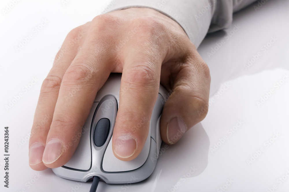 Close up of businessmans hand on computer mouse Close up of businessmans hand on computer mouse
