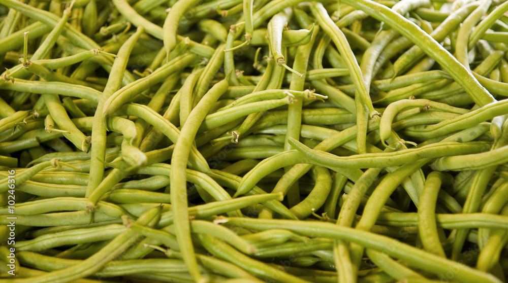 Fresh long green beans in a farmers market Fresh long green beans in a farmers market