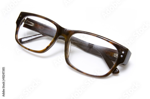 Mens glasses isolated on a white studio background