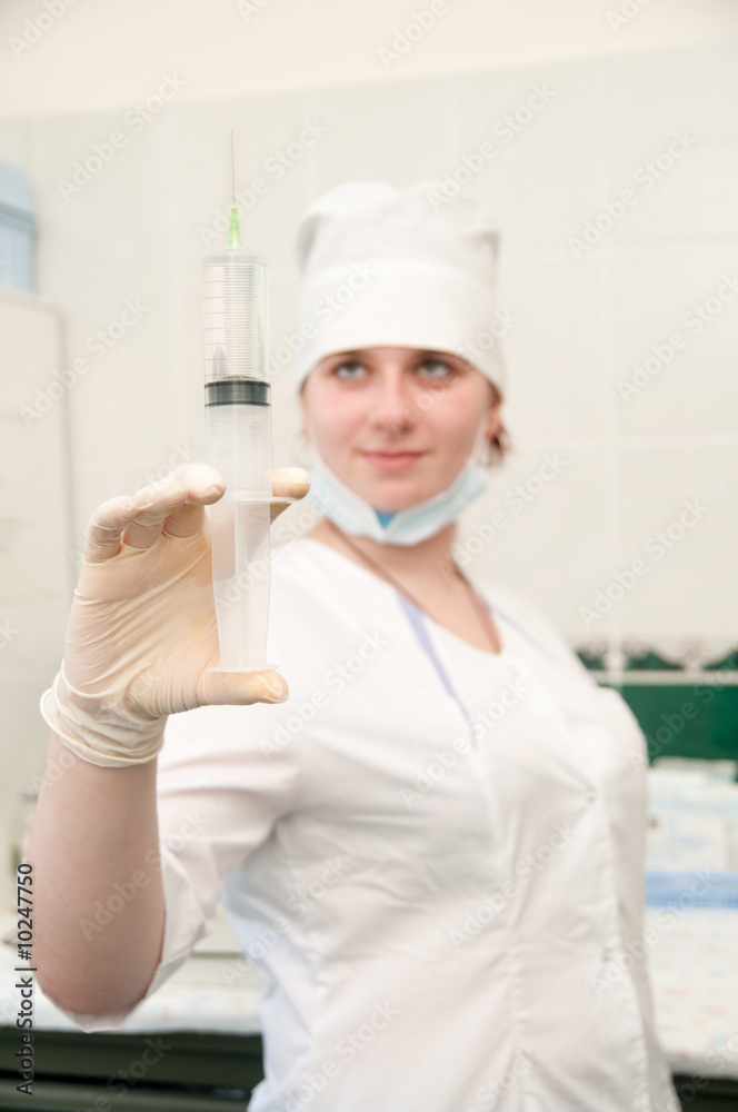 A nurse with syringe A nurse with syringe