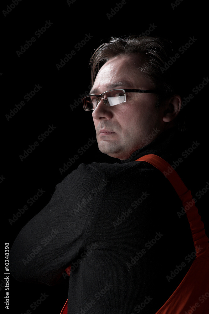 Fototapeta premium Emotional the man on a black background