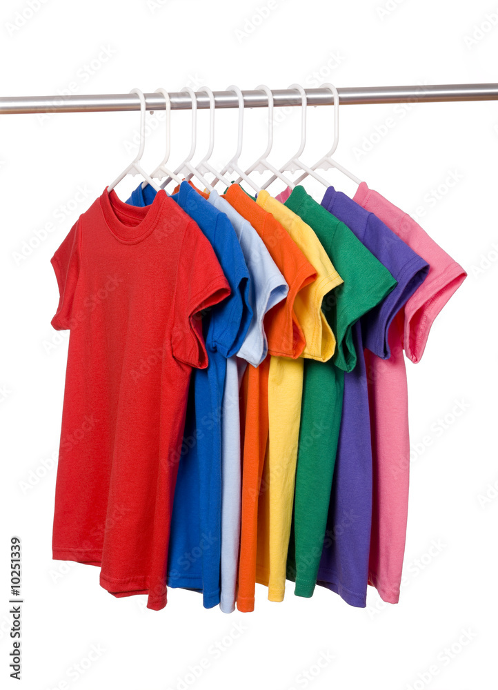 A row of colorful row t-shirts hanging on hangers Stock Photo | Adobe Stock