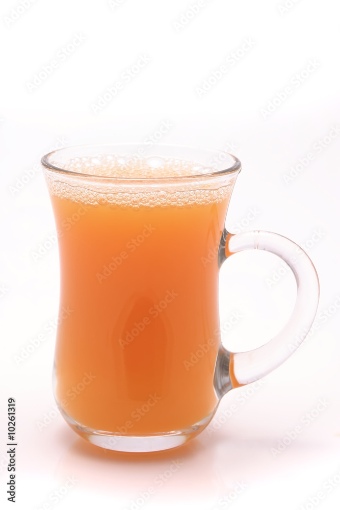 small transparent glass with orange juice small transparent glass with orange juice