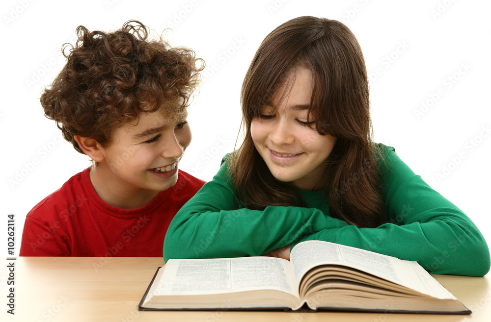 Kids learning at home, reading book - isolated on white Kids learning at home, reading book - isolated on white