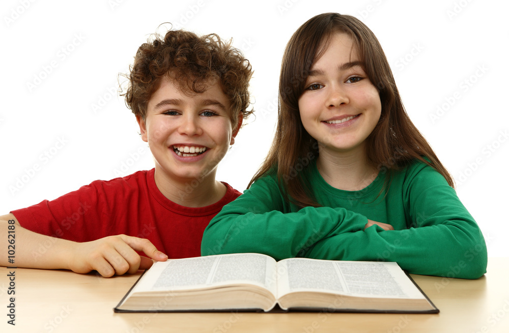 Kids learning at home, reading book - isolated on white Kids learning at home, reading book - isolated on white