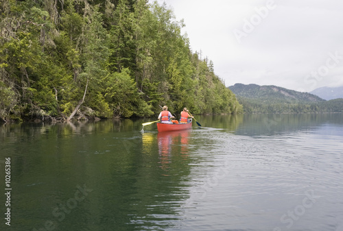 Girl and boy canoeing, Canada © amelie