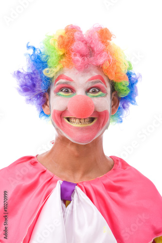 funny looking clorful clown making faces on white background
