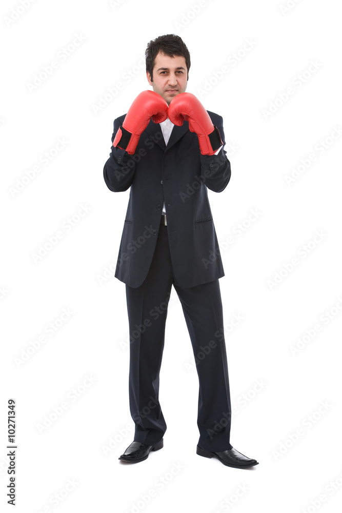 young businessman with boxing gloves and ready to fight on white young businessman with boxing gloves and ready to fight on white