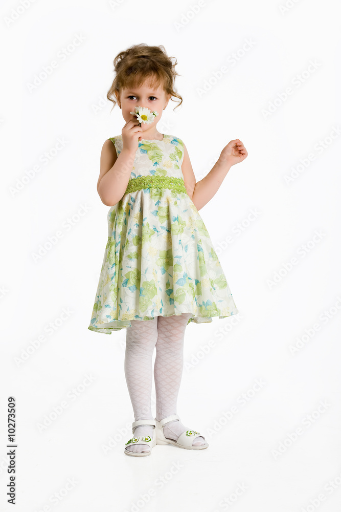Little girl smelling the flowers Little girl smelling the flowers