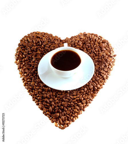 Cup of coffee and grain in the form of heart