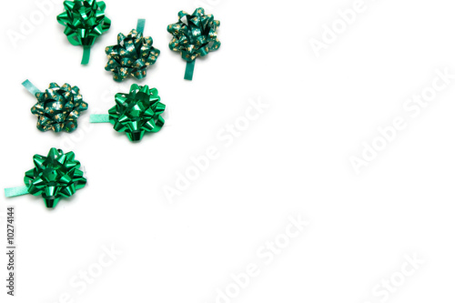 frame made of green bows isolated on white